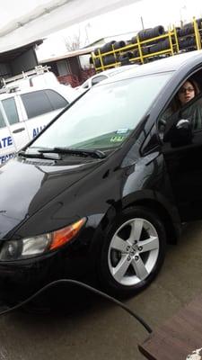 A happy customer leaving HTOWN AUTO GARAGE! After a fender bender, the driver's side fender had to be replaced and painted!