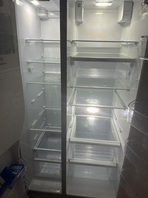 Inside of the fridge cleaned after a party at an Airbnb.