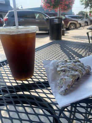 Iced Americano with a mixed berry scone