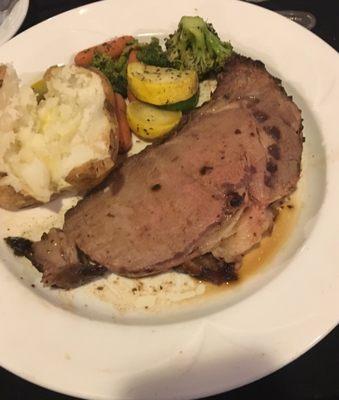 Prime Rib, baked potato and vegetable medley.