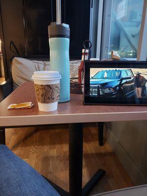 My cozy corner for a few binge hours of Yellowstone and an Americano.