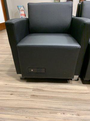 That's pretty cool.  Power & Phone chargers built into the chairs in the waiting room.