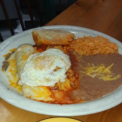 Mexican plate with tamale and Christmas Montada enchiladas, rice and beans.