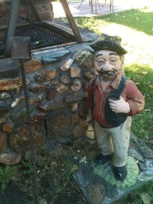 Little man protecting the grill.