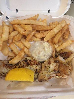 Grilled tilapia and fries.