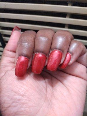 Tammy did an awful job on my nails. She put four coat of nail polish on each finger, leaving my nails looking like thick sausages.