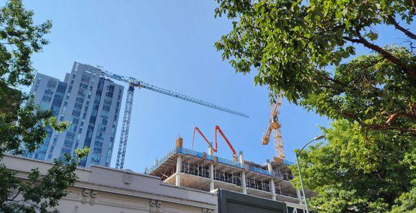 Looking upward across the street...UDistrict has several high rises now (8/25/23)