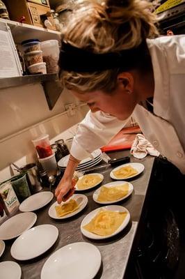 Egg yolk in window ravioli with truffle oil. Photo by Toby Sanderson. All rights reserved.