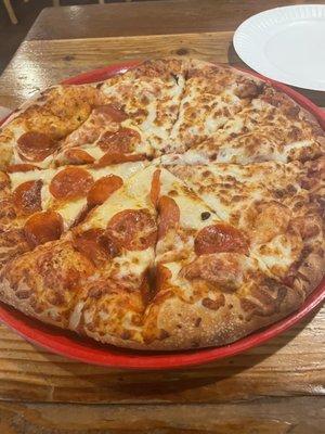 Medium half pepperoni half cheese pizza with extra cheese