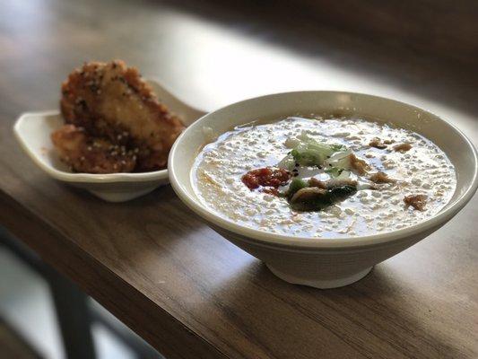 The chicken jook with a side of fried chicken. The chicken was boneless.