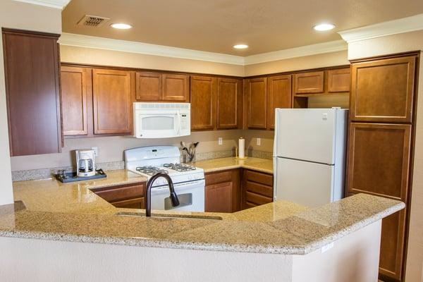 Granite Counters, Cherry Cabinets, Gas Appliances