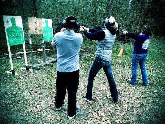 Chester teaching the ladies shooting  technique with ease.