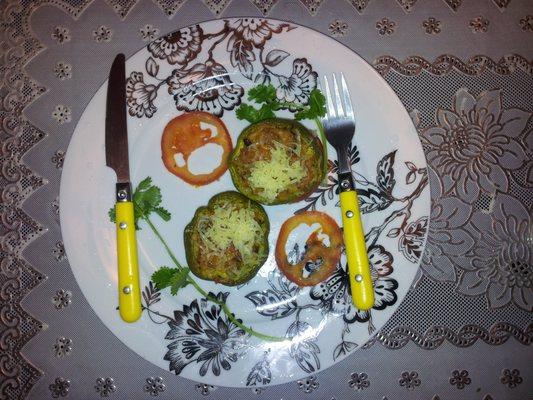 Baked capsicum stuffed with flavored rice