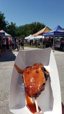 "Pork Pop" Pork Loin on a stick with a Cherry Dr. Pepper glaze.