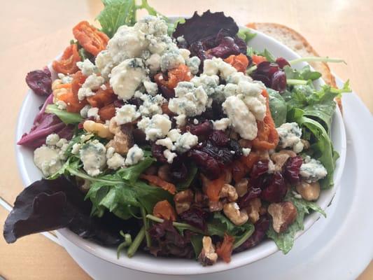 Harvest salad - mesclun greens, dried apricots, dried cranberries, walnuts, blue cheese & balsamic dressing