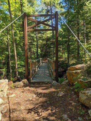 The bridge crossing the creek.