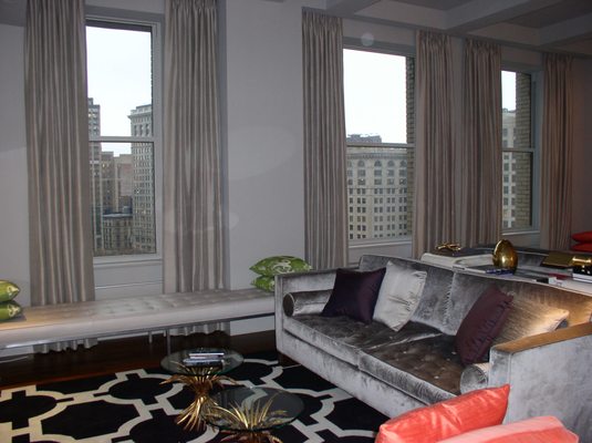 Custom lined & interlined curtains, custom sofas, custom metal leg bench with leather grid tufted top