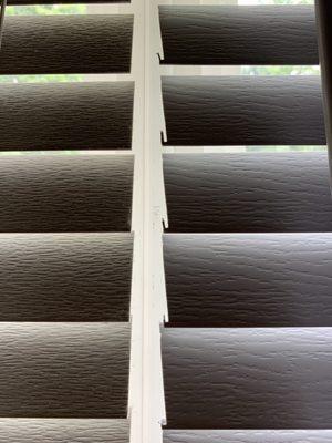 The left side is the original blinds, the right side is his attempt at cutting the new blinds.