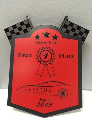 A custom acrylic award for a Grand Prix race.