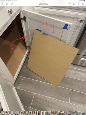 Cabinet siding was never attached to its proper siding. Left inside the cabinet not attached.