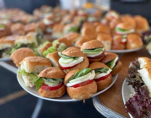 Platters of Tomato, Basil and Mozzarella sliders prepared by The Epicurean Connection.