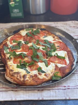 Margherita Pizza using their tomatos, cheese, marinara sauce.