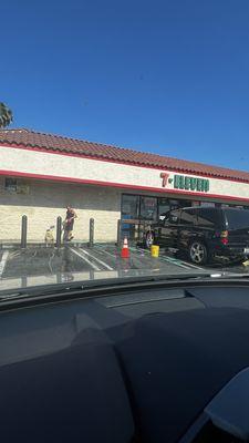 Man wetting people while washing car as they exit 7-11