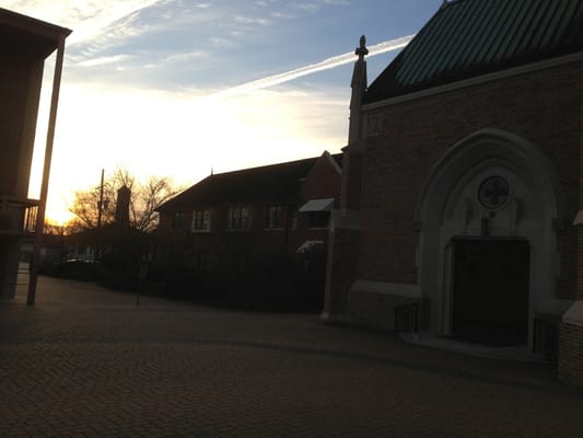 Sunrise over the courtyard and Priest's Rectory.