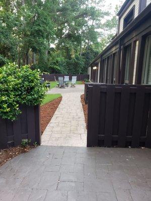 Houndslake Wellness Center in the Back Courtyard. Hands and Stones LLC is located in the back.