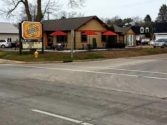 Exterior of our coffee house.  Come have a seat and enjoy the weather with a friend relaxing on our patio.