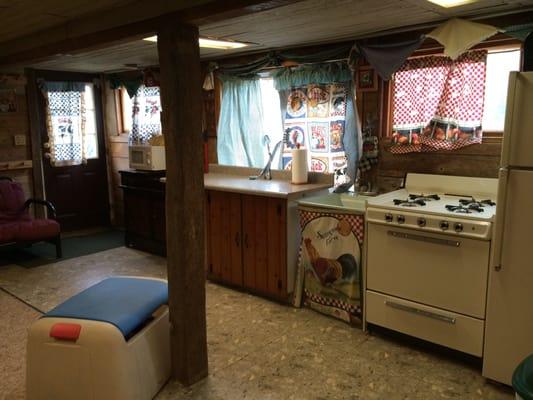 The first floor of the Cottage has a full kitchen and dining area