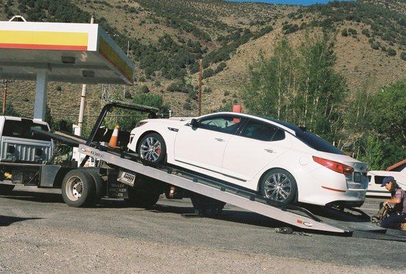 Damon slowly releasing my car from the flatbed