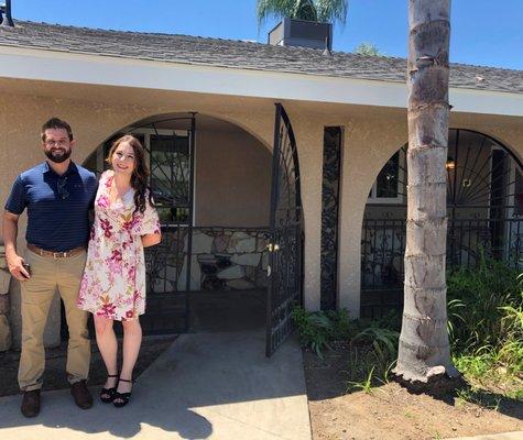 Arynne Broom & Garrett McColl in front of our new house