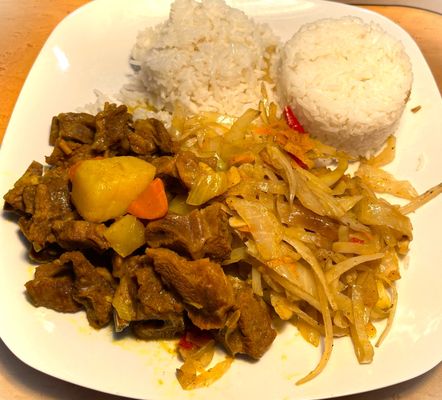 Curried Goat, White Rice & Cabbage