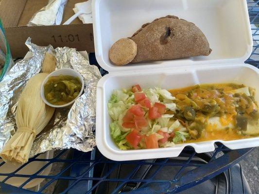 Smothered roast beef burrito, chicken tamale with green sauce, biscochitos, and an apple empanada.