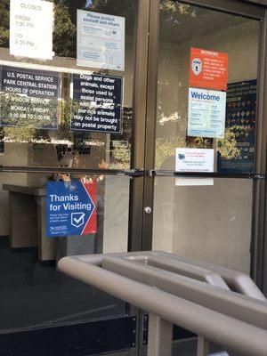 Front door with closed sign at top left