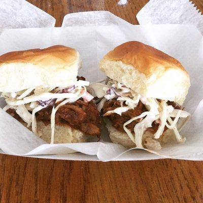 New pulled pork Sliders on Hawaiian rolls w sweet baby rays BBQ and sweet slaw.