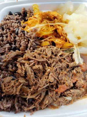 Congri, ropa vieja, yucca and a little bit of chicken.