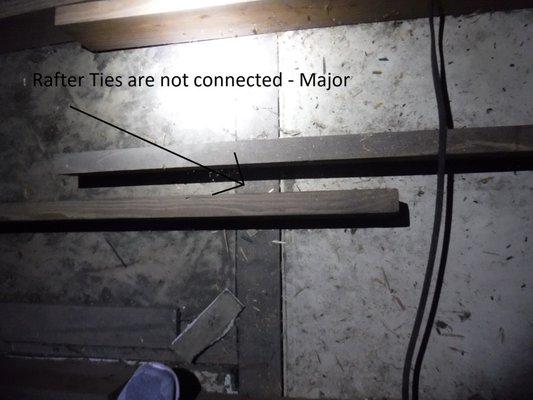 Yikes! The rafters ties are no longer connected. This would of been a big a problem if our client would have purchased this home.