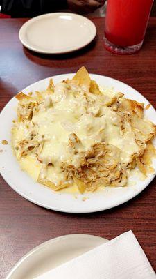 Half order of chicken nachos appetizer.