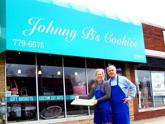 Owners Susan and John in front of the bakery on Mack Ave.