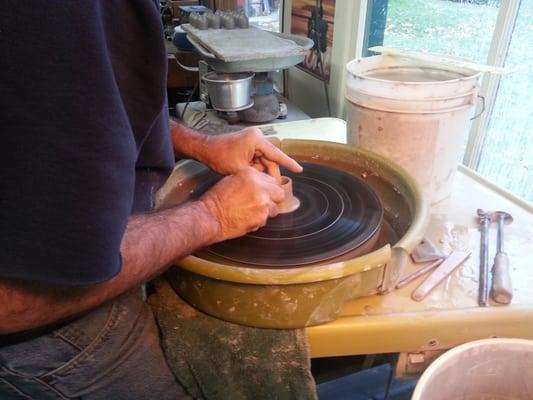 Matt making pottery...all done by hand.  No molds.