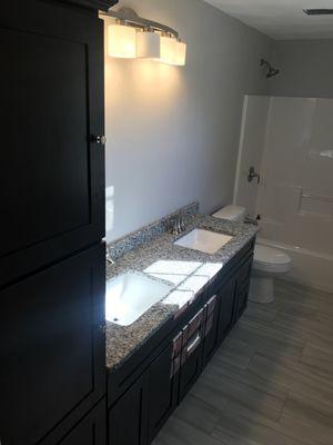 Bathroom vanity and linen closet