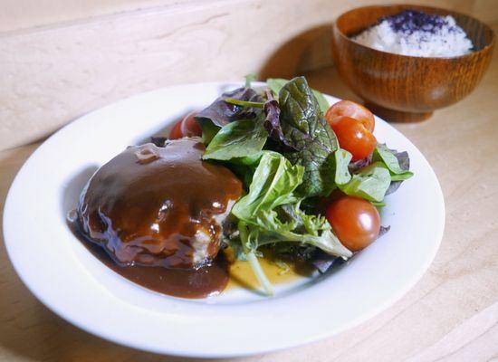 Demi Glace Hamburg with Mixed Green Salad - A beef hamburger steak with our red wine demi glazed sauce.  Served with rice and 2 sides