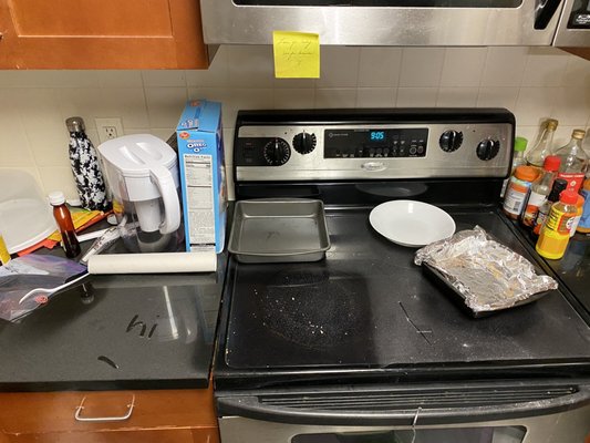 Look at the amount of dust in the kitchen after they painted the ceiling. Had to toss out so many things.