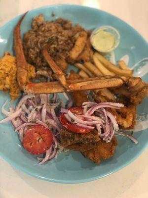 Crab, green sauce, rice, fries. Delicious Peruvian food!