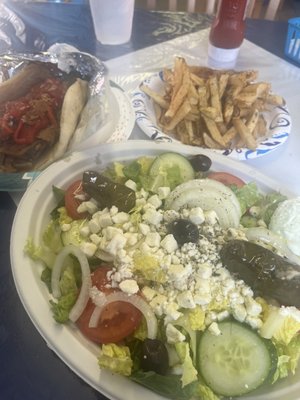 Greek salad, eggplant and roasted red pepper sandwich and fries