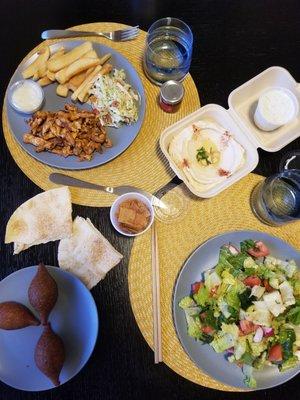 Chicken shawarma platd ($20), 3 kibbehs ($10), hummus ($9), side of yogurt and cucumber ($5), fattoush salad ($12)