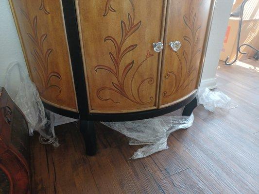 Shrink wrap left on furniture