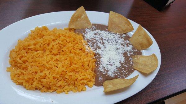 Side of rice and refried beans,  so good